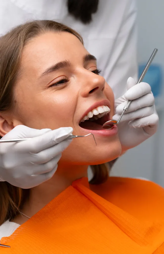 Dentist placing a dental implant during surgery in a Turkish dental clinic
