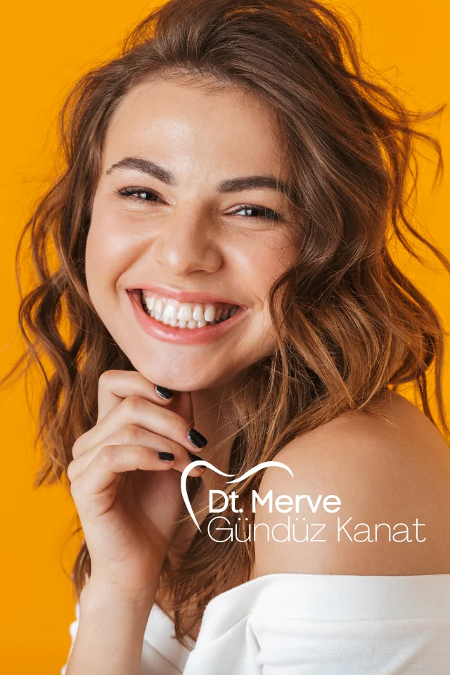 Confident patient smiling after digital smile design
